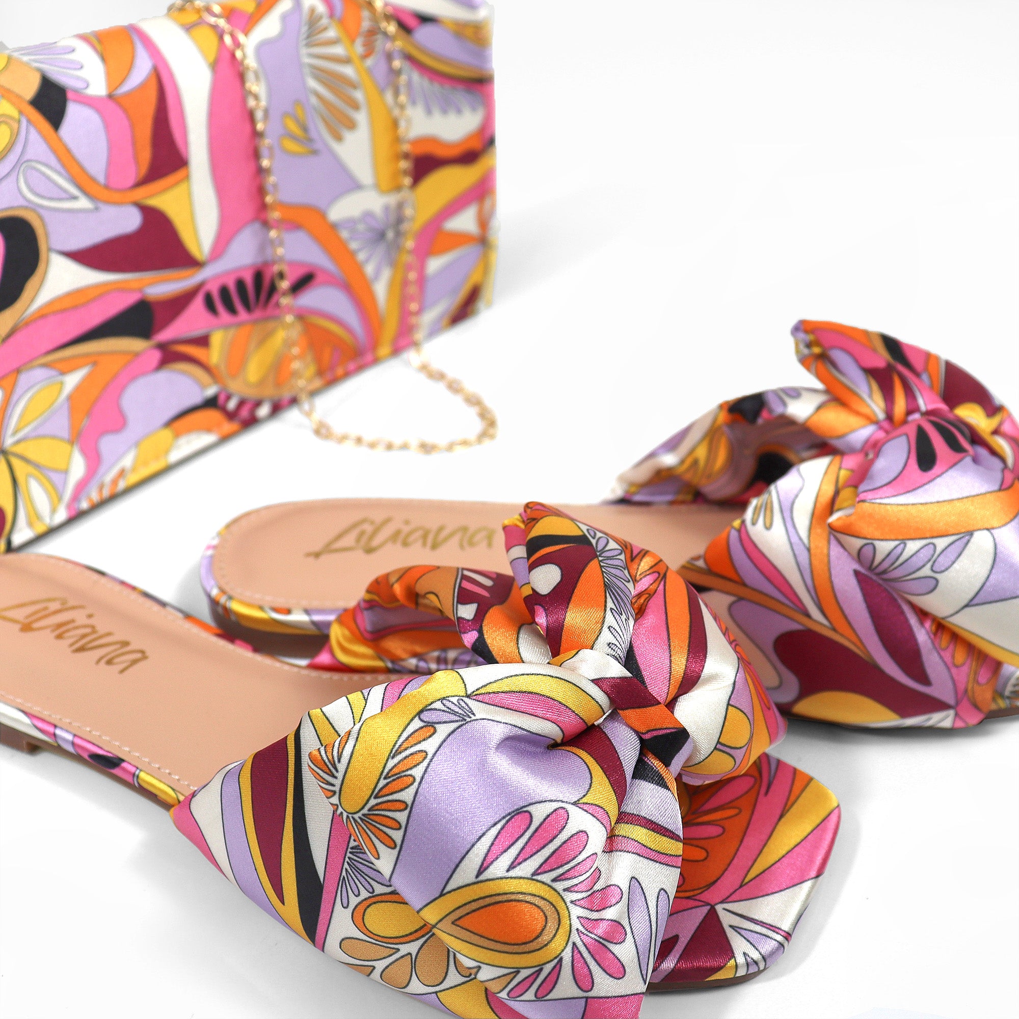 BREEZY-6 OVERSIZED PADDED BOW SANDAL FUCHSIA