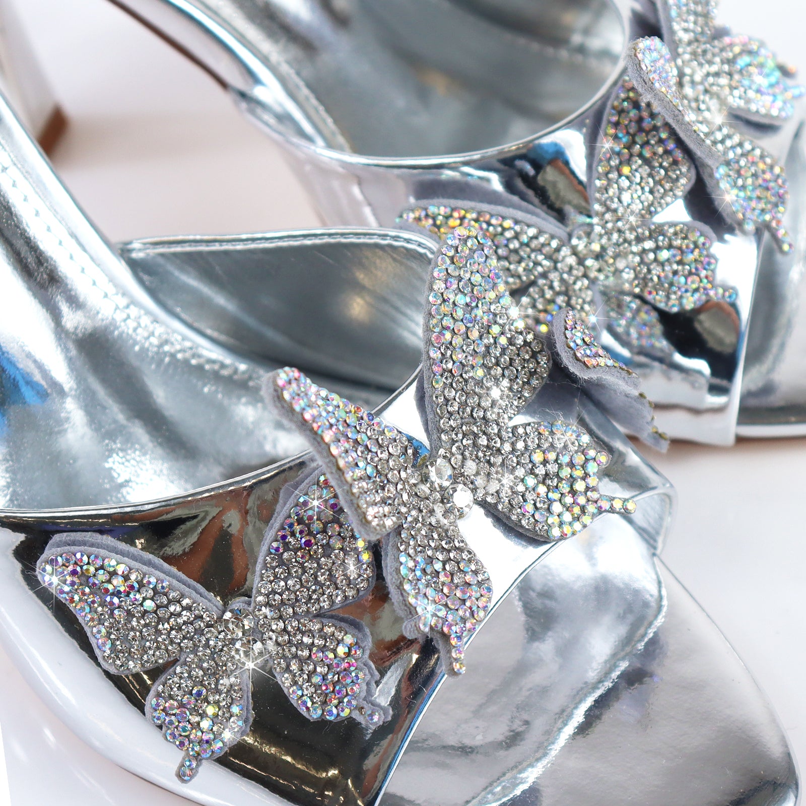 KIMANI-1 POINTED TOE 3D BUTTERFLY PATENT HEELED SILVER