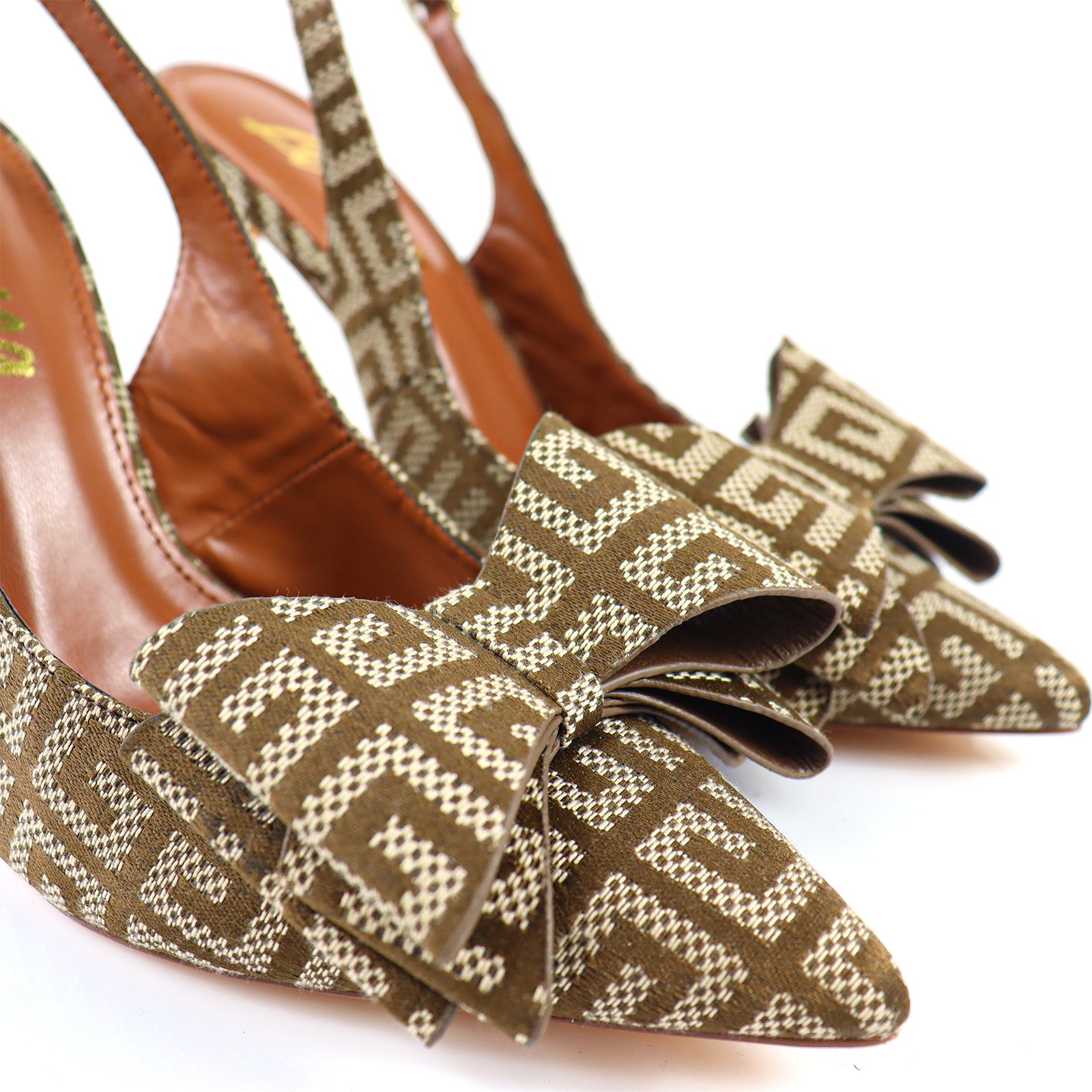 LANA-1 POINTED TOE BOW BACK STRAP PUMP MONOGRAM