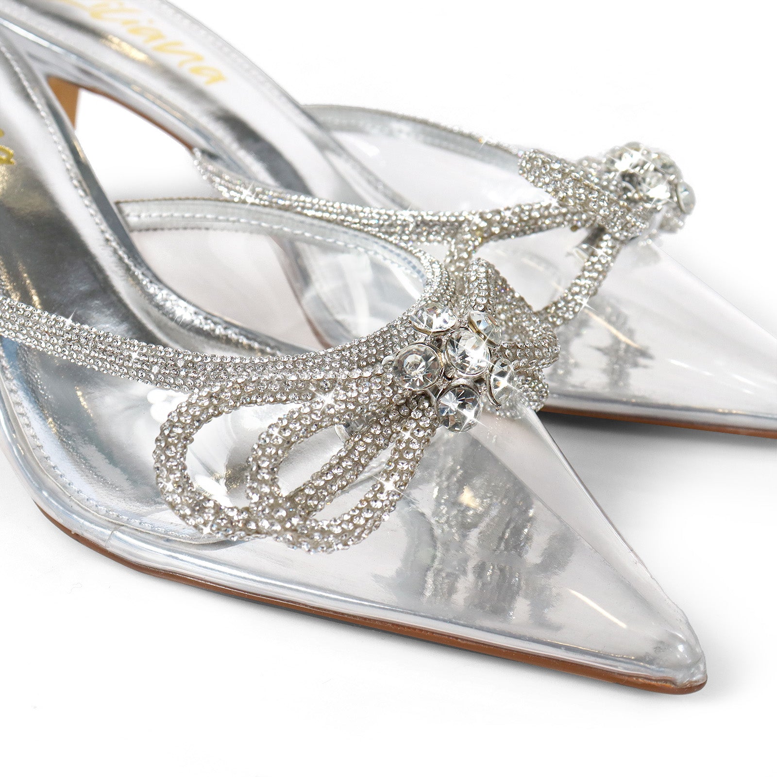 ROMANTIQ-1 POINTED TOE RHINESTONE BOW MULES W/KITTEN CLEAR