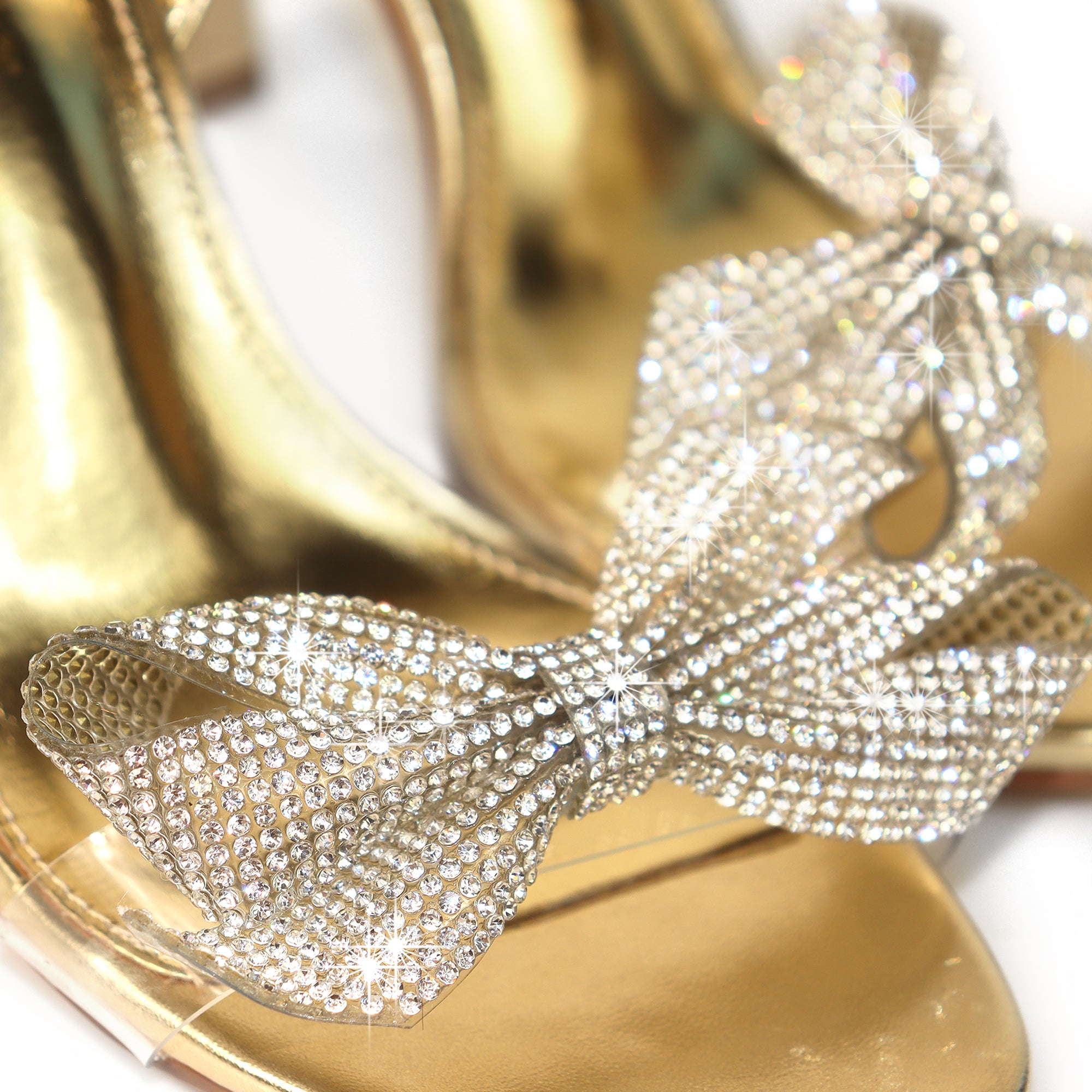 SOLSTICE-1 OPEN TOE RHINESTONE BOW ANKLE STRAP W/ HEEL GOLD